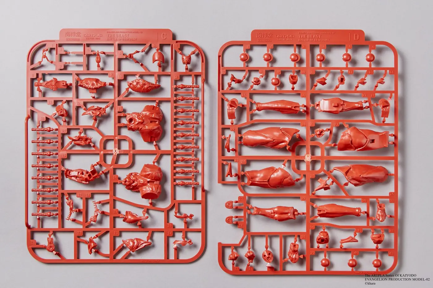 Red plastic runners C and D with limb, body and small detail parts