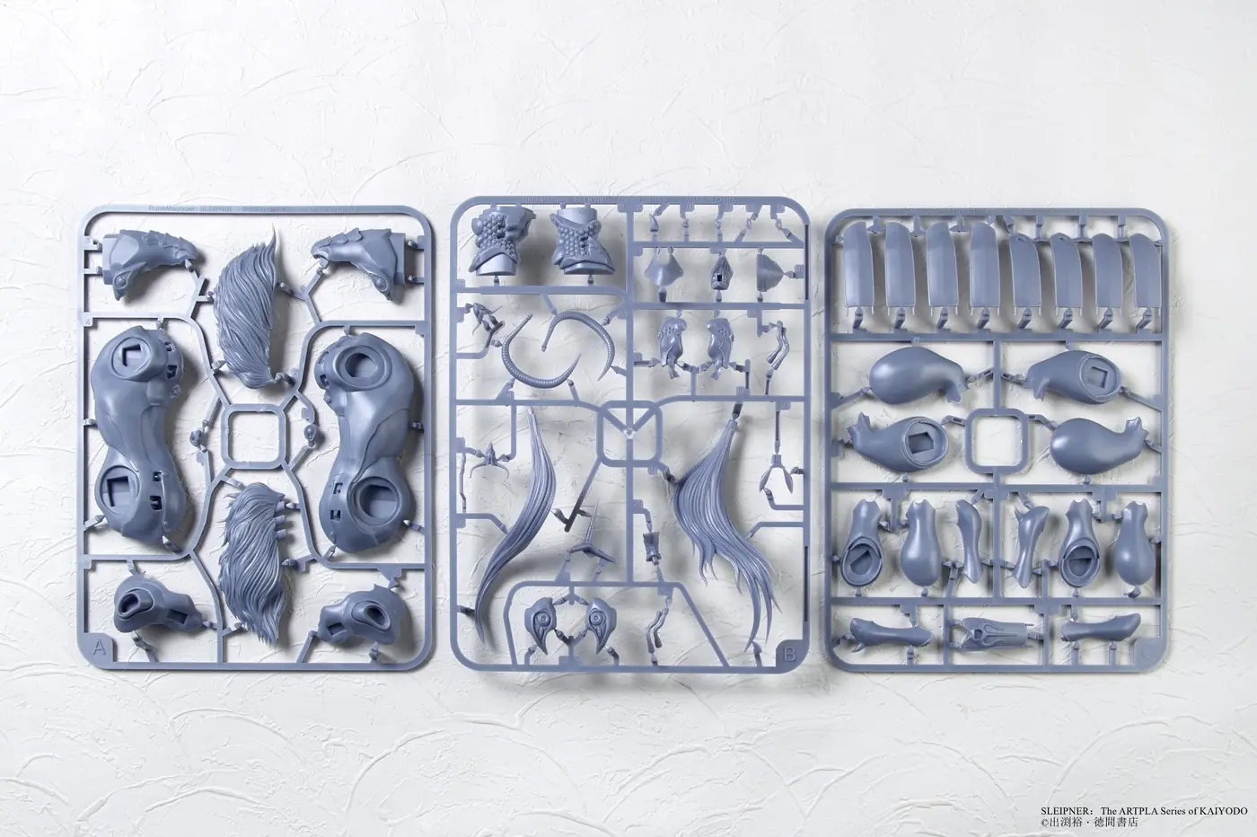 Gray molded runners with major body, mane and armor components for the KAIYODO ARTPLA Sleipnir model kit